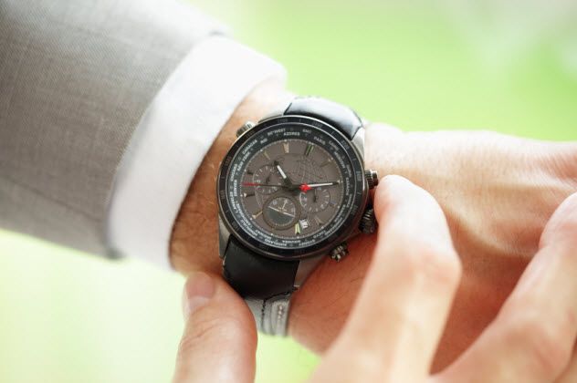10-looking-at-watch-late_000055070170_Small