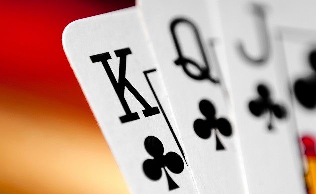 playing cards on a colorful soft background