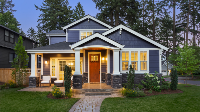 A nighttime view of a home's exterior