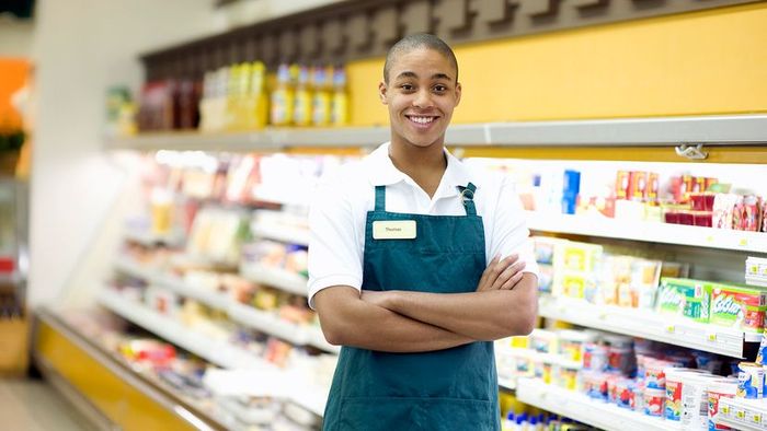 teen working in a supermarket