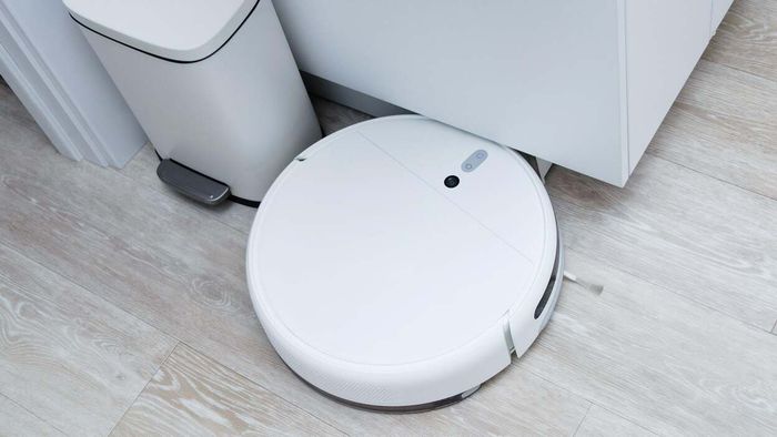 Robot vacuum cleaner trapped under furniture