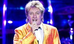 Rod Stewart performing on stage