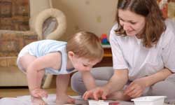 mother and child enjoying fingerpainting together