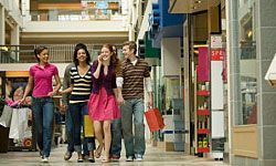 tweens walking through the mall