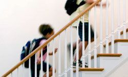 children sprinting up steps