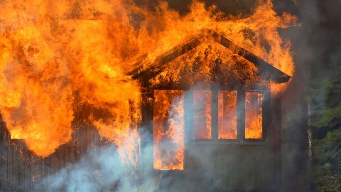 A single-story home is completely consumed by fire