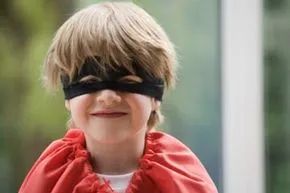 Boy dressed as a superhero