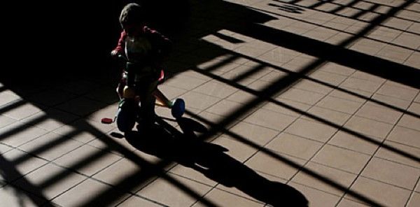 Child Riding Trike at Aranjuez Prison