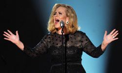 Adele in a black lace dress