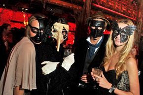 attendees at a masquerade ball
