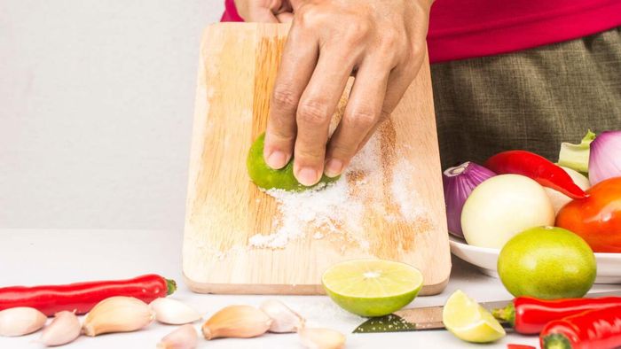 Clean and disinfect butcher blocks and cutting boards