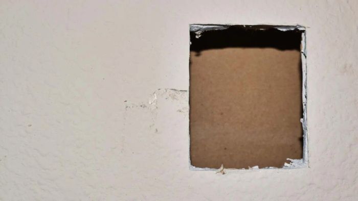 Fix wall holes using a butterfly patch