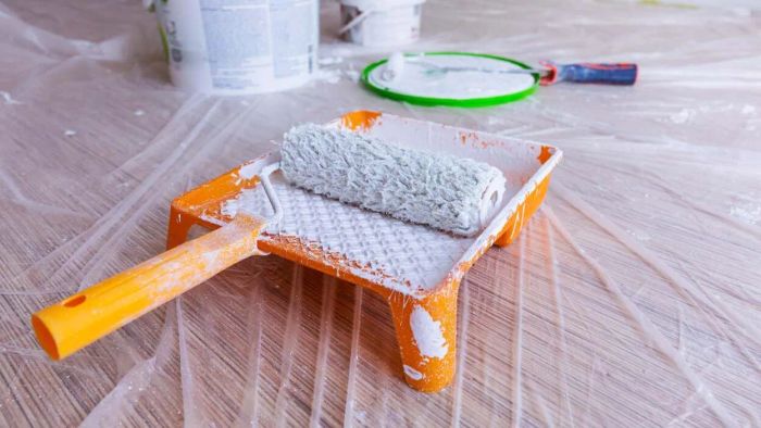 Protect your brushes and rollers by wrapping them in plastic