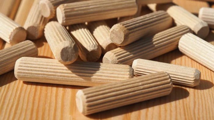 Reinforce stripped screw holes with dowel pins