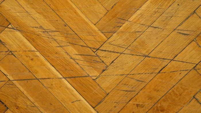 Eliminate hardwood floor scuffs with a tennis ball
