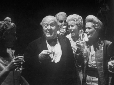 745336~John-Christie-Enjoying-Champagne-Party-Backstage-After-Performance-Of-Figaro-Glyndebourne-Festival-Posters.Jpg