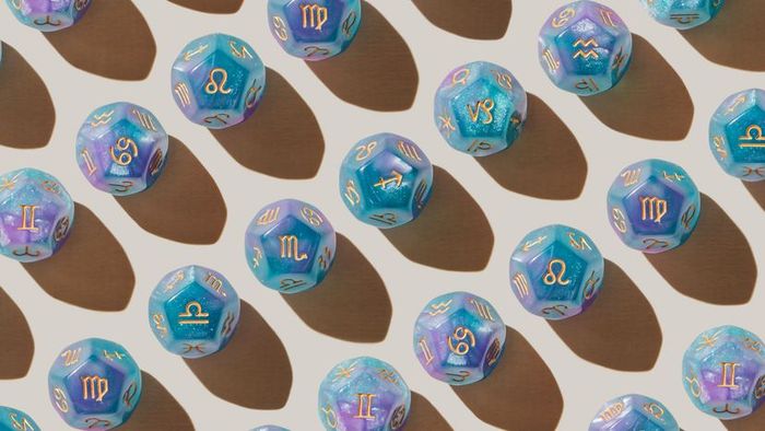 Cubes displaying zodiac symbols.