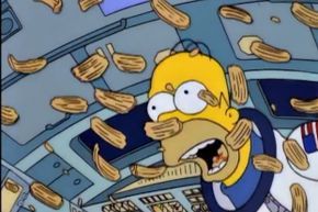 Homer Simpson: effortlessly floating and snacking like a pro.