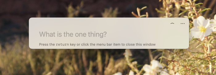 A Mac pop-up prompts the user to identify their 