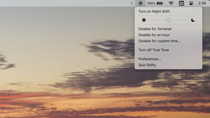 A macOS menu bar displaying the Night Shift app icon, featuring a range of configuration settings, including a slider to control the intensity of the red tint.