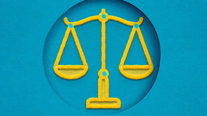A depiction of the Scales of Justice in yellow, set against a vibrant blue backdrop.