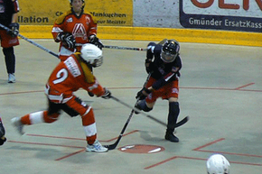 A smooth, flat, and spacious surface, usually made of concrete or asphalt, is perfect for a makeshift 'rink.'