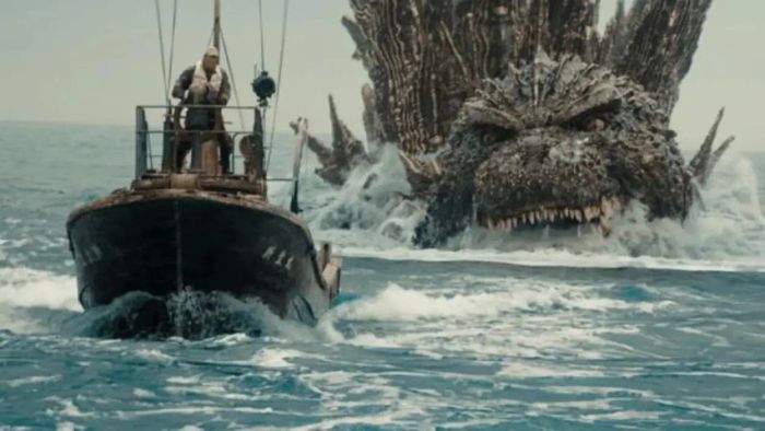 A thrilling scene from Godzilla Minus One shows Godzilla pursuing a boat.