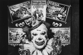 A promotional image for the Ringling Brothers & Barnum and Bailey circus features a clown surrounded by a collage of vibrant posters.