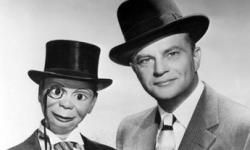 A portrait of the legendary American ventriloquist Edgar Bergen with his famous dummy, Charlie McCarthy.