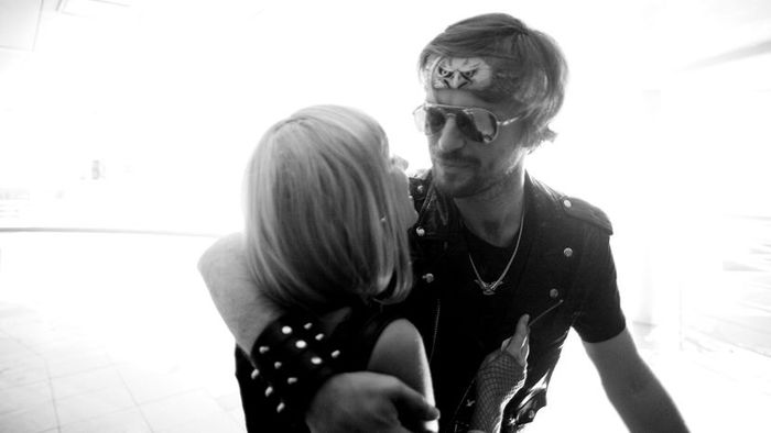 A monochrome photograph capturing a legendary rock and roll pair.