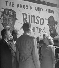 A quartet performs a jingle during a commercial break to promote 
