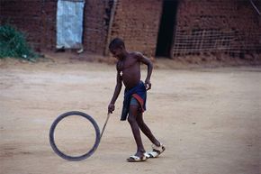 a child playing with a hoop