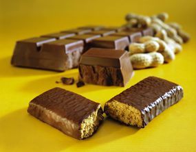 A stack of chocolate-coated energy bars.