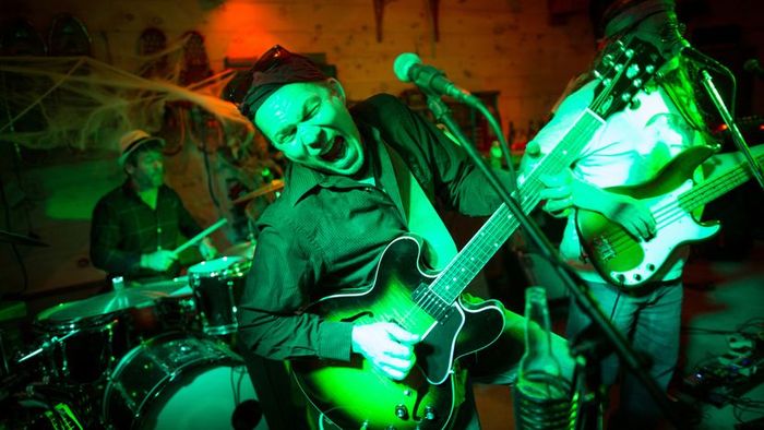A live band performing at a vibrant party.