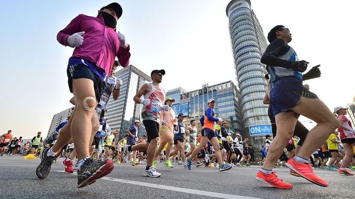 Men engaging in outdoor sports and athletic activities.