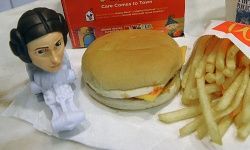 A McDonald's Happy Meal featuring a Princess Leia toy is shown.