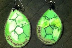 A fascinating blend of science and Shrinky Dinks: These earrings depict the chemical compound thujone.