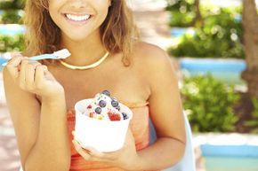 enjoying yogurt with fruit