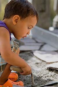 children engaging in dirt play