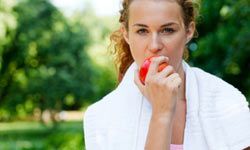 woman enjoying an apple