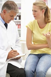 A woman consulting with her doctor