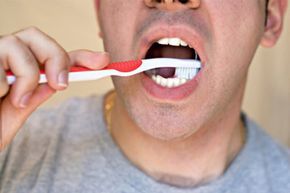 A man brushing his teeth