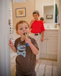 Since siblings naturally compete over everything, turn their rivalry into a positive by creating a daily tooth-brushing contest.