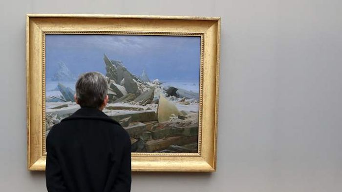 A man admiring Caspar David Friedrich’s masterpiece, ‘The Sea of Ice.’