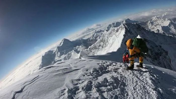 Climbers ascending toward the peak of Mount Everest.