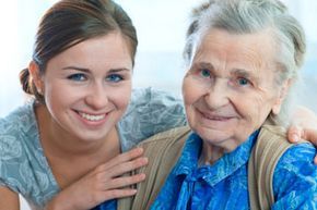A young woman spending time with an elderly woman