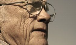 elderly man wearing glasses