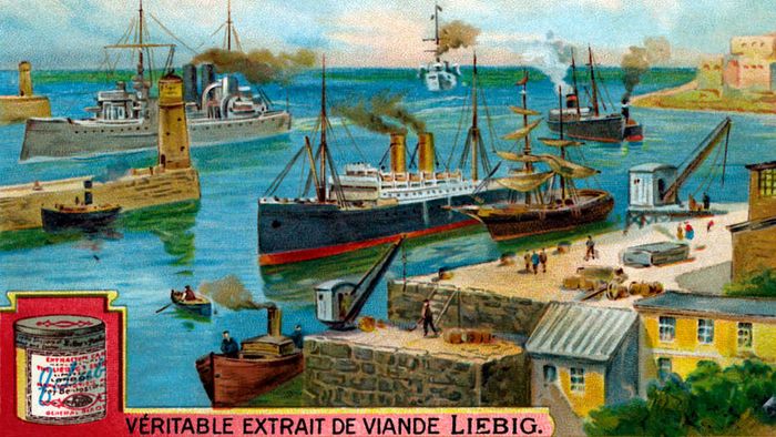 An advertisement displays a panoramic view of the Panama Canal's entrance at Cristobal.