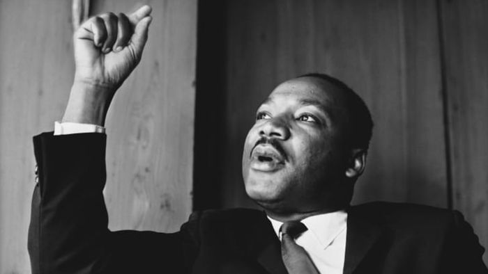 Dr. Martin Luther King Jr. speaking at a press conference in London, September 1964.