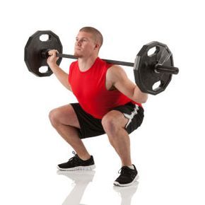 A weightlifter performing a squat lift